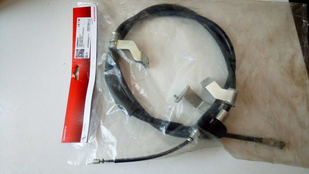 Трос стояночного тормоза ручника левый hyundai tucson 597602E500