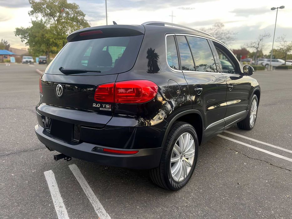 Volkswagen Tiguan      2014