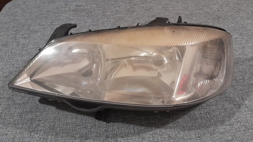 Lampa opel astra g lewy przód Hella