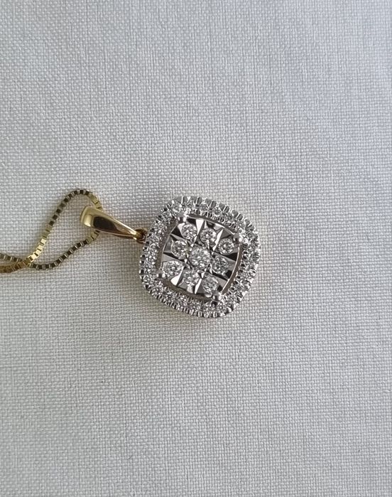 Złota zawieszka z diamentami Au.585 0,13ct wisiorek z brylantami