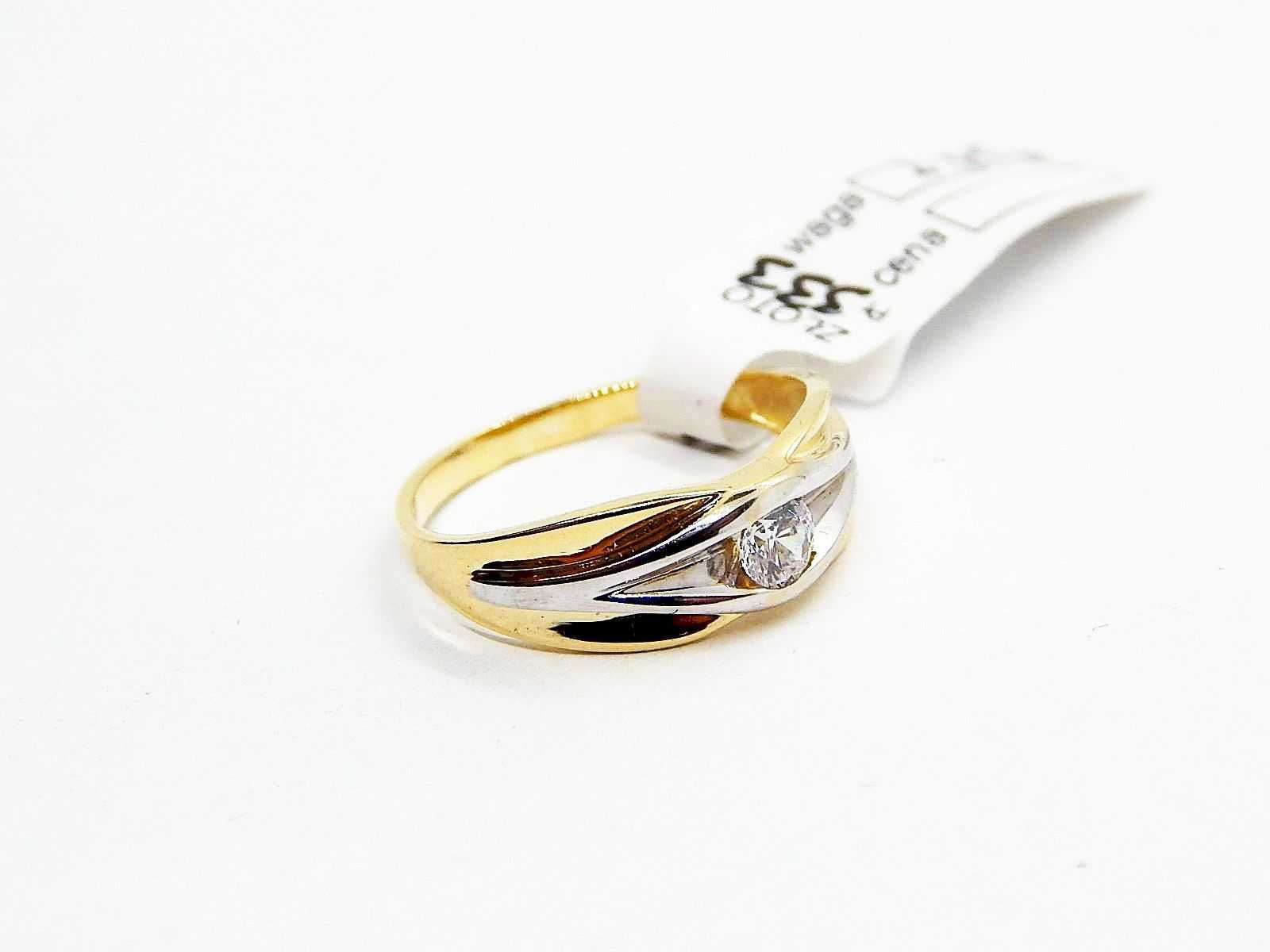 Złoty pierścionek z cyrkonią białe złoto pr. 333 waga 2,25 g roz. 15
