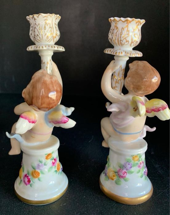 Par de casticais com dois anjinhos da artibus