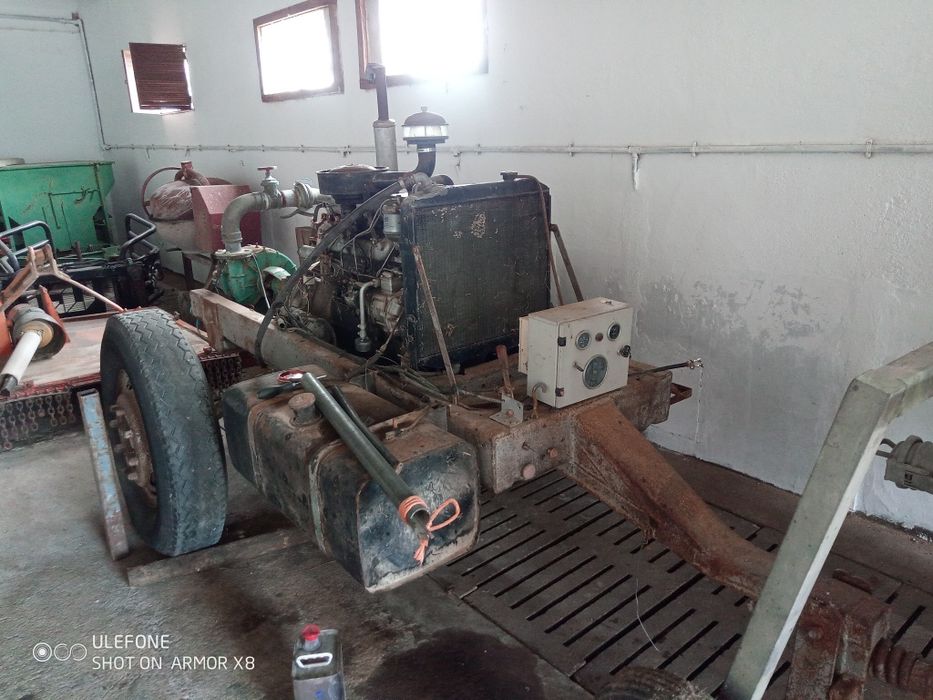 Rolo com canhão de rega e bomba de tirar água