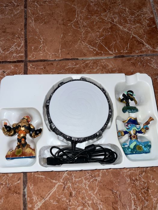 Skylanders portal e figuras swap force