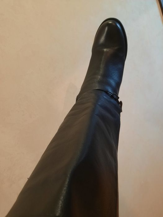 Шкіряні чоботи, високі