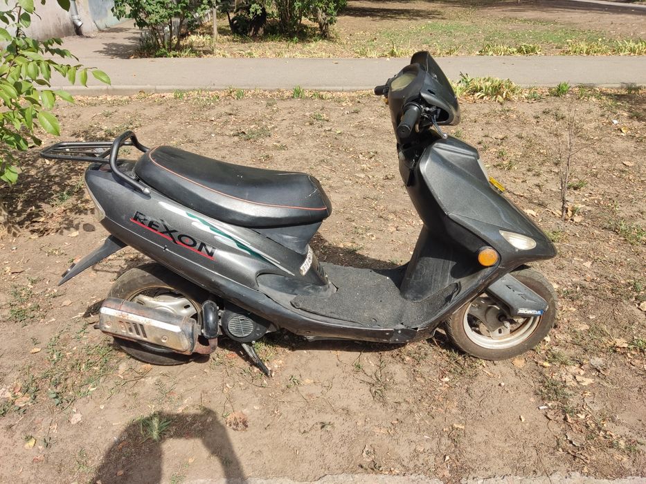 Продам скутер honda rexon.