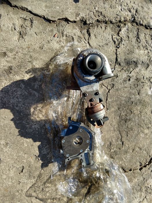 Масляний насос opel Insignia 2010 2.0 118 кв 55566000