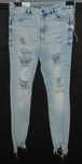 Elastyczne jeansy z dziurami H&M 42