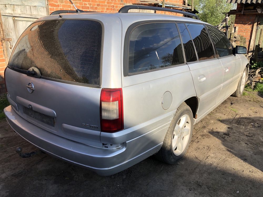 Разборка Opel Omega B бампер капот дверь фары двигатель салон ляда гбц