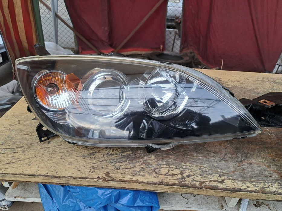 Фари передні  Мазда 3.