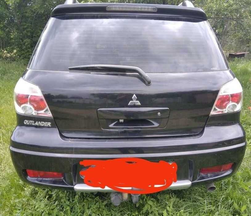 Мицубиси аутлендер