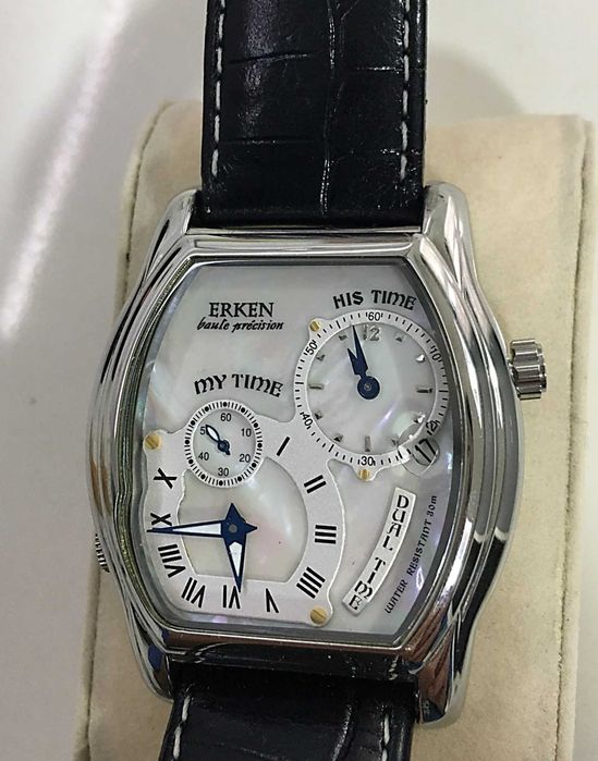 Erken relógio multifunções em aço polido