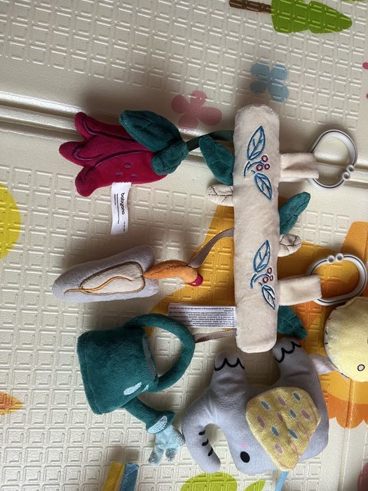 Дуга брязкальце на коляску