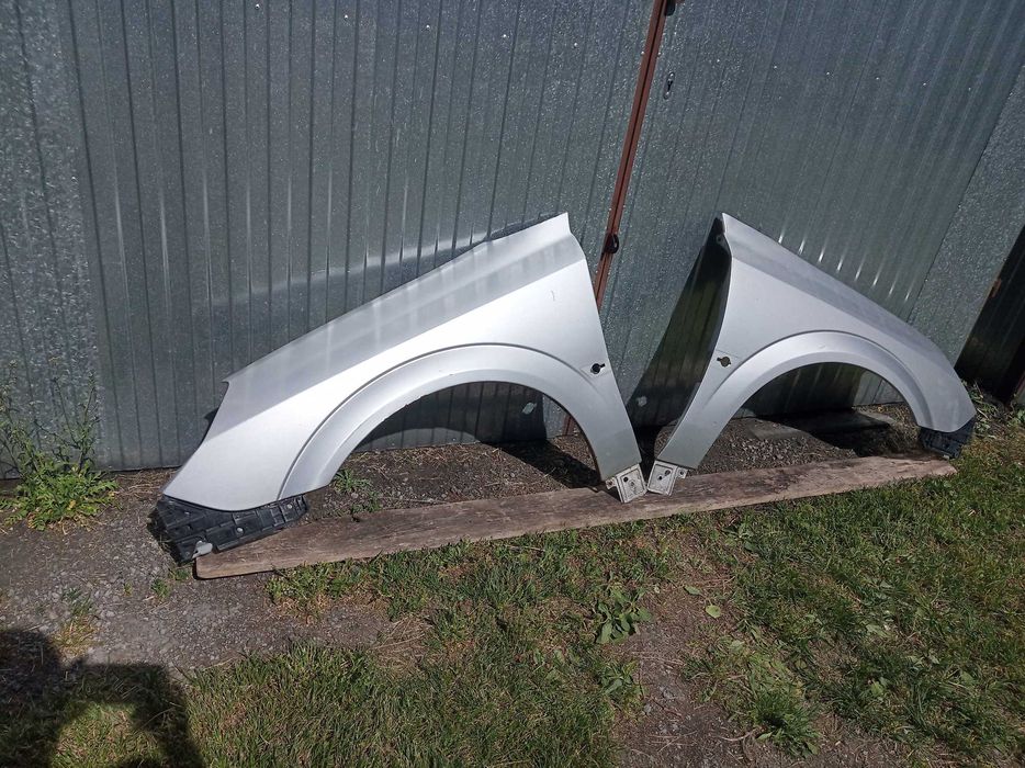 Opel vectra C LIFT Błotnik prawy przód L.P. srebrny Z157