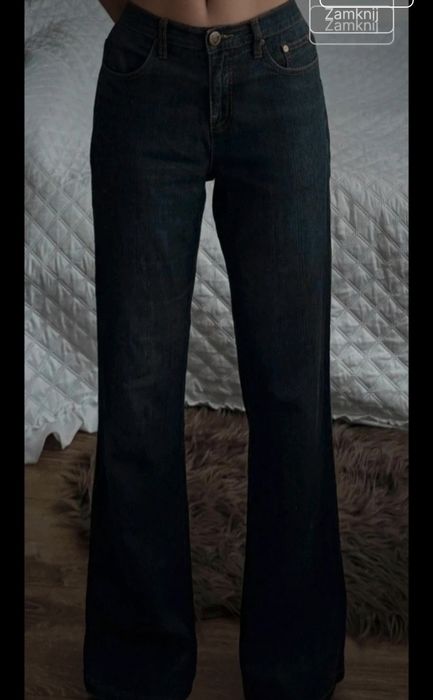 Vintage jeansy ze zdobionymi kieszeniami