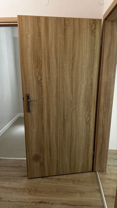 Drzwi pokojowe wewnętrzne Dąb Sonoma 90 lewe pełne z klamką