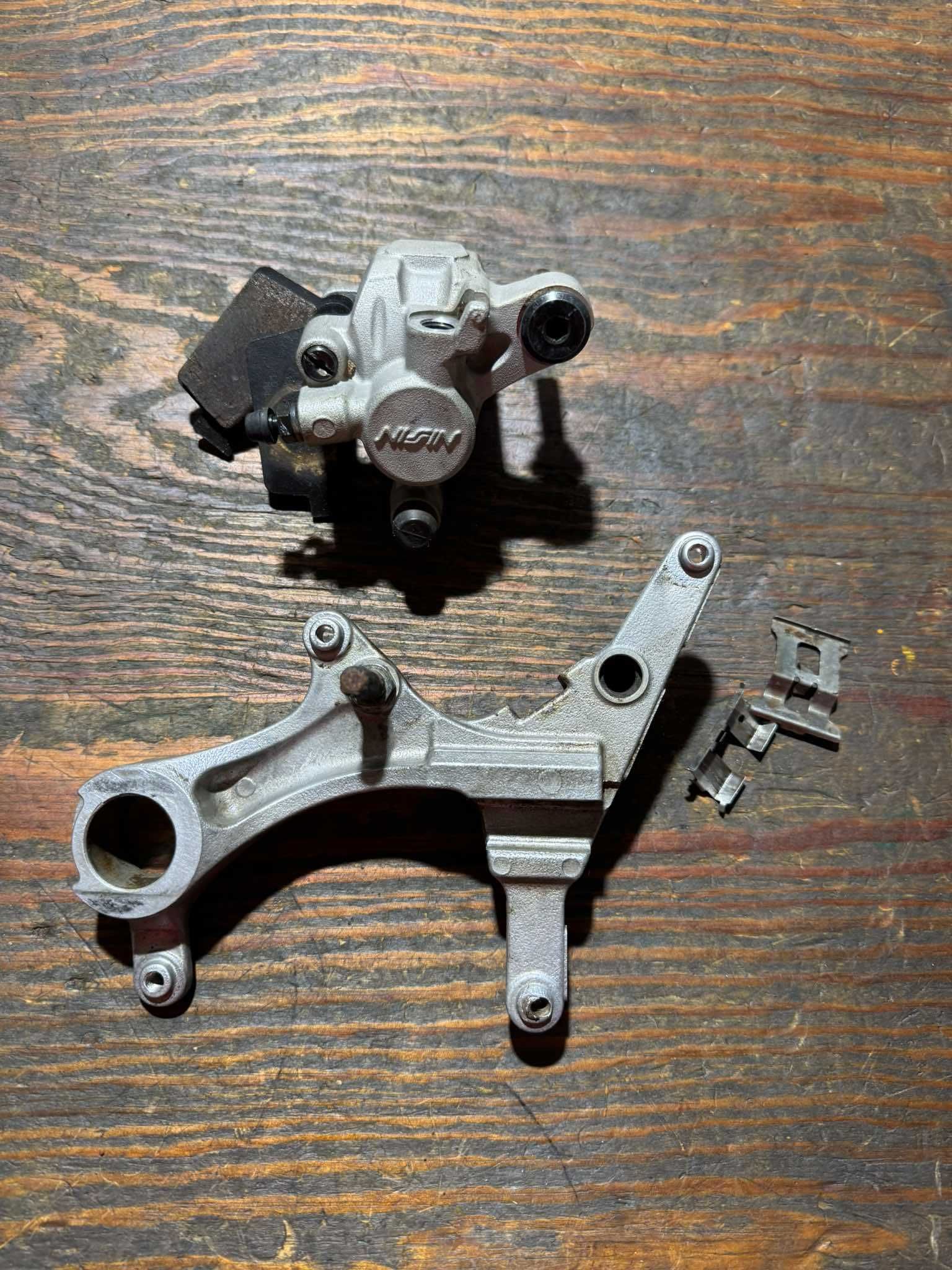 komplet tyln nissin zacisk z jarzmem tyl kawasaki kxf klx kx 250 / 450