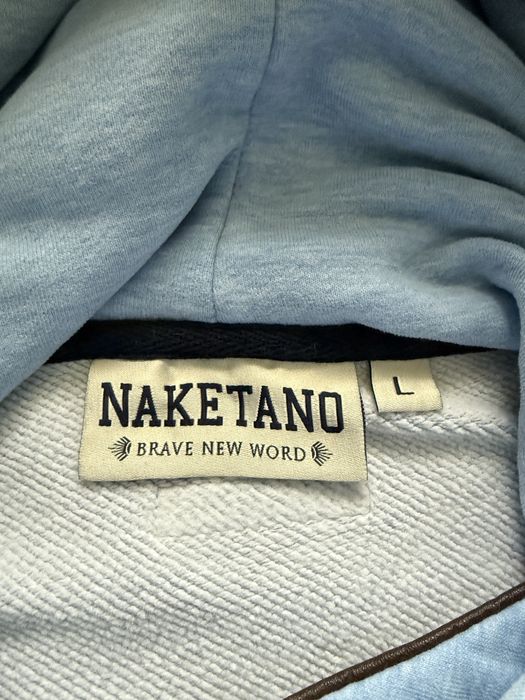 Bluza damska oversize niebieska z wysokim kołnierzem i kieszeniami