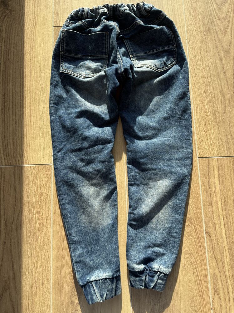 Spodnie jeansy przecierane 134