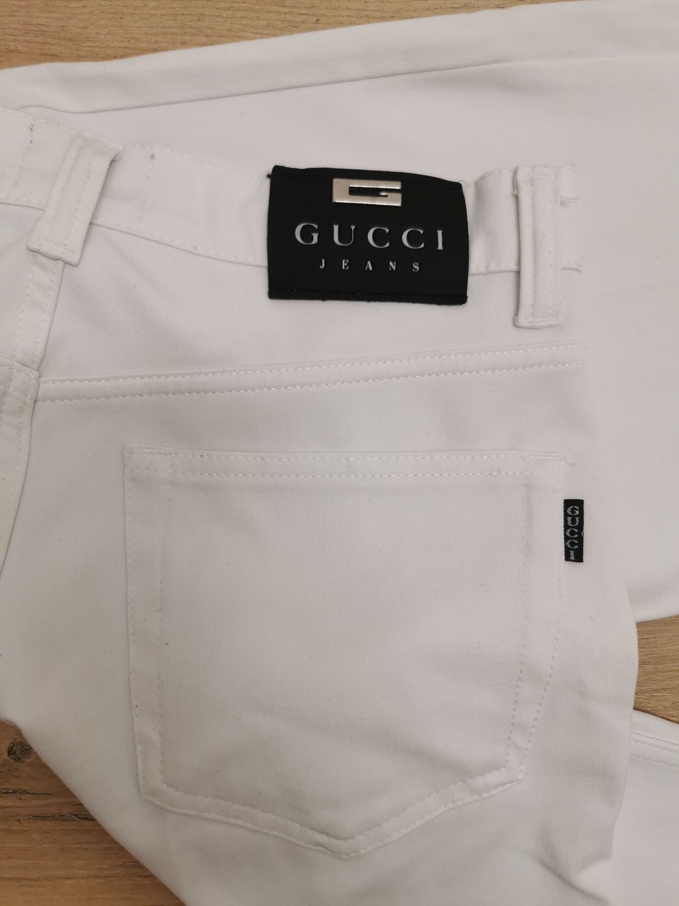 Białe spodnie/dżinsy Gucci 32/34