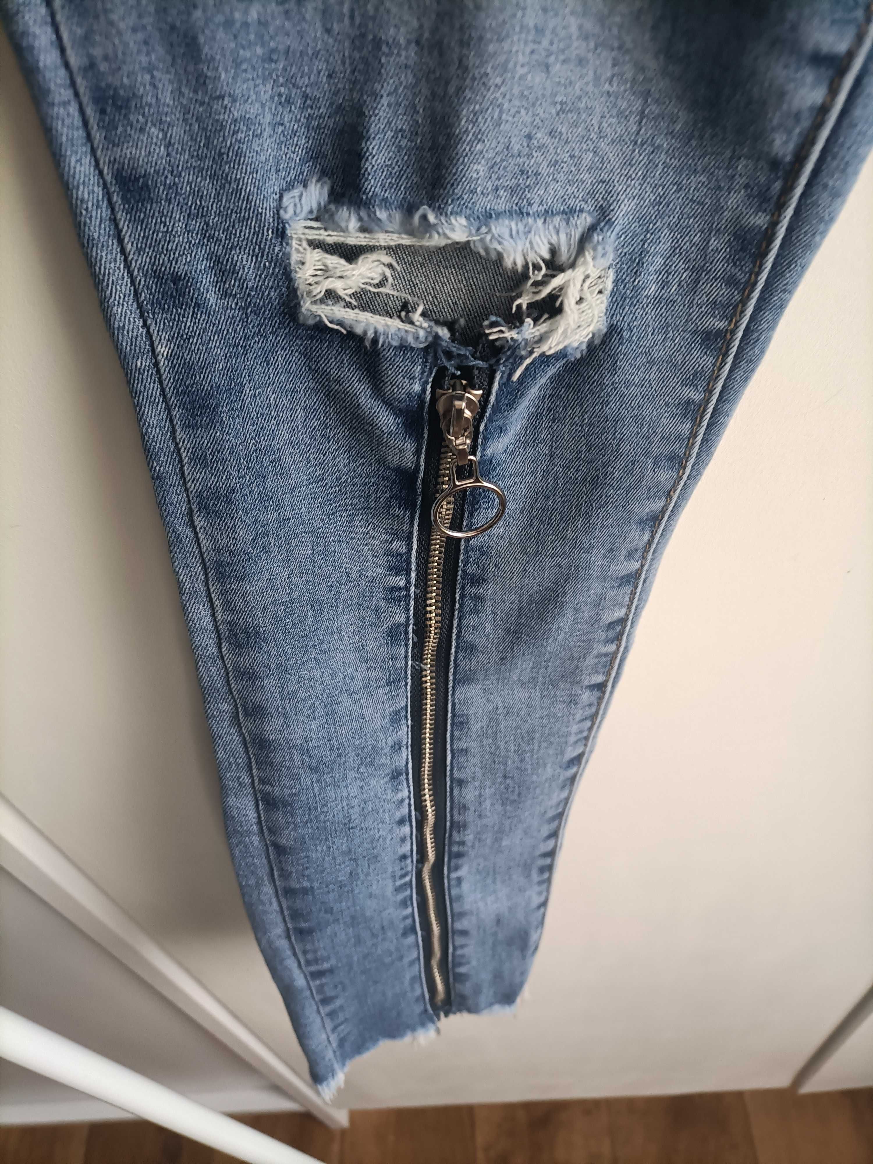 Spodnie damskie jeansowe z zamkami suwakami r.M
