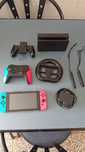 Nintendo swich com acessórios e fifa 25 e fortnite cartão de 128 gigas
