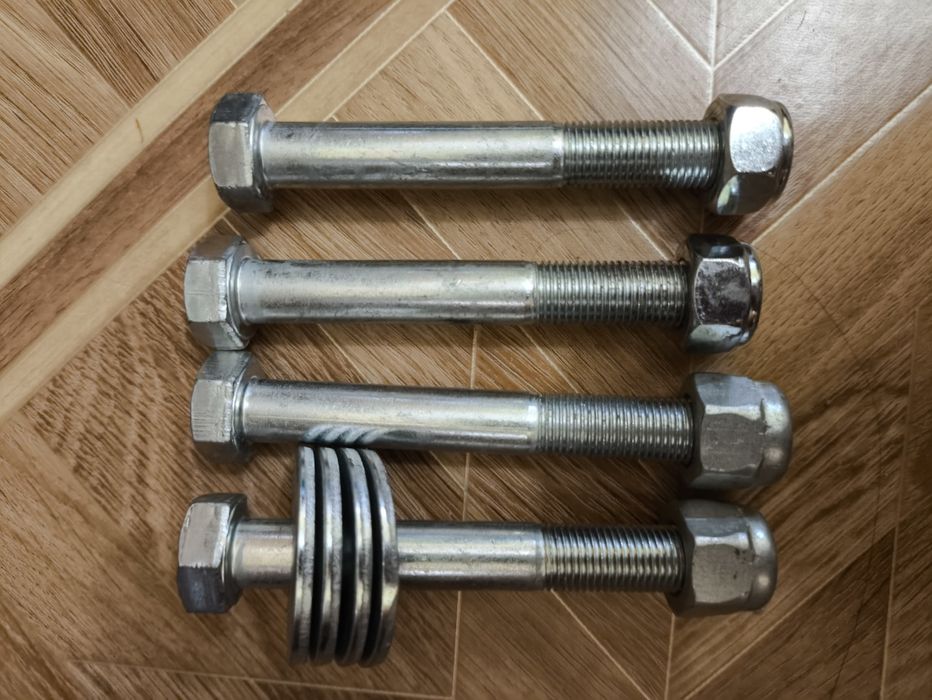 Болт сайлентблока задньої балки Daewoo Nubira