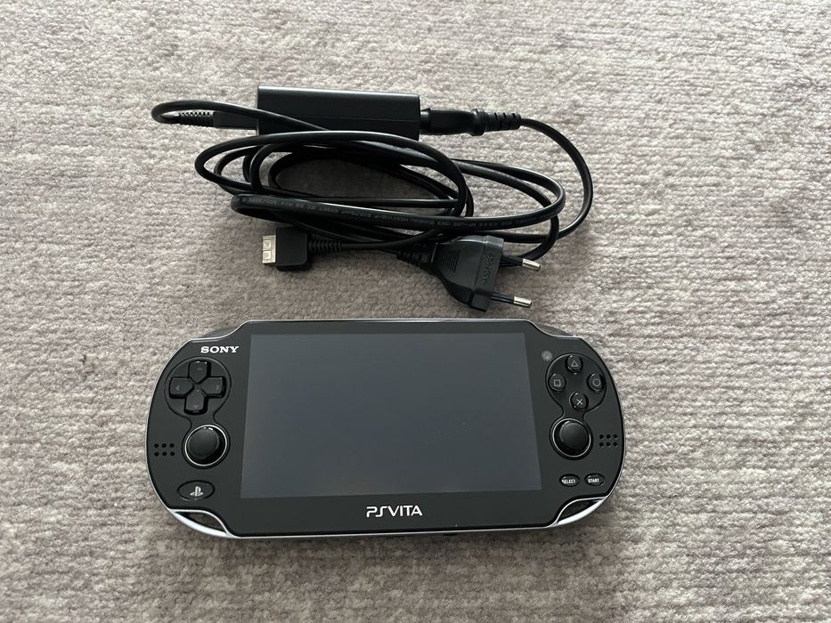 PS Vita com caixa original, 8 jogos e bolsa de transporte
