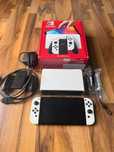 Nintendo Switch OLED 64gb kartą