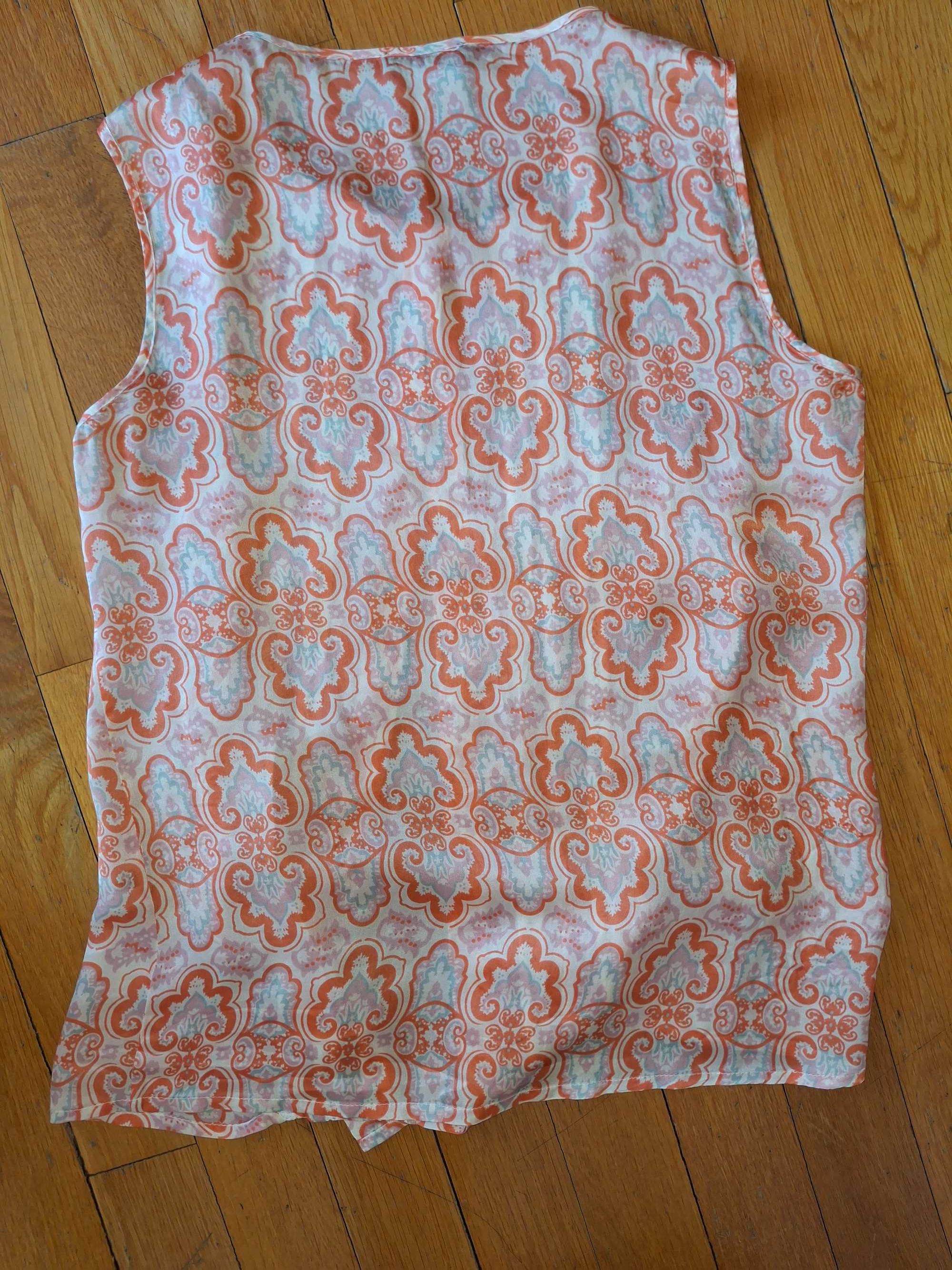 Blusa Globe tam XL