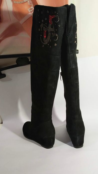 Высокие зимние сапоги