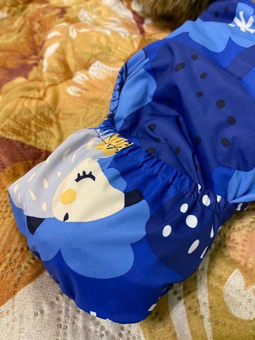 Продам зимний комбинезон Huppa 62см