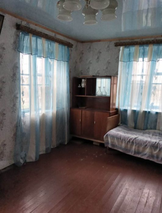 Ділянка з будинком