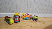 Wywrotka Vtech ciężarówka Dumel interaktywne pociąg Fisher Price