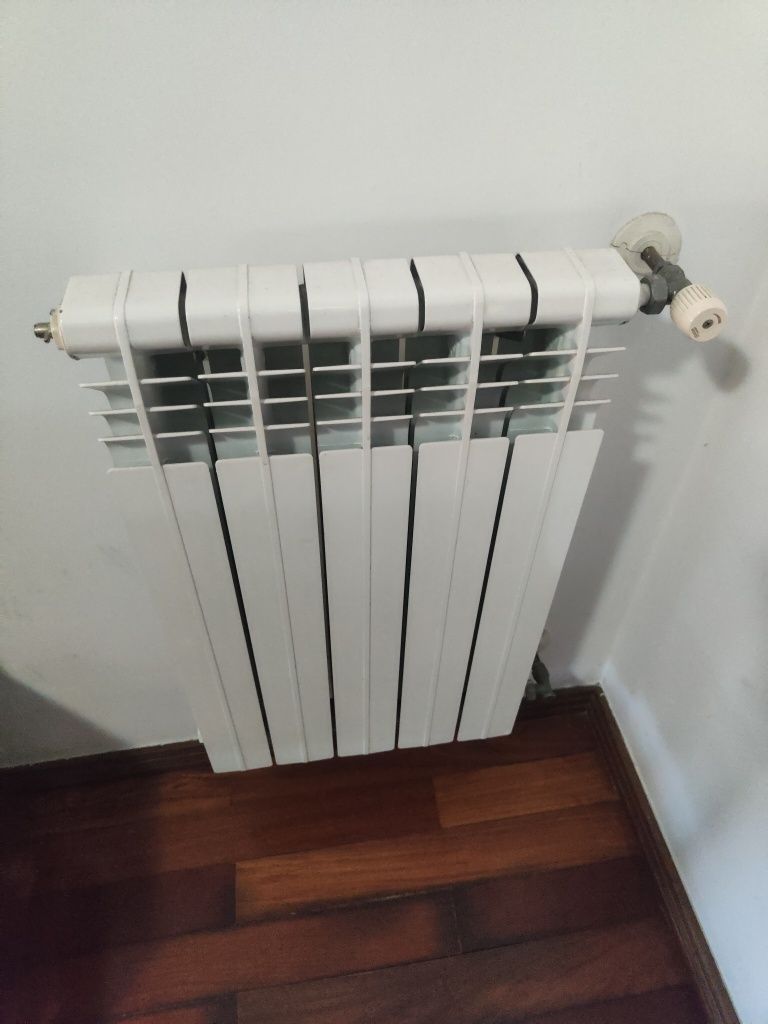 Caldeira a gás, radiadores e seca toalhas