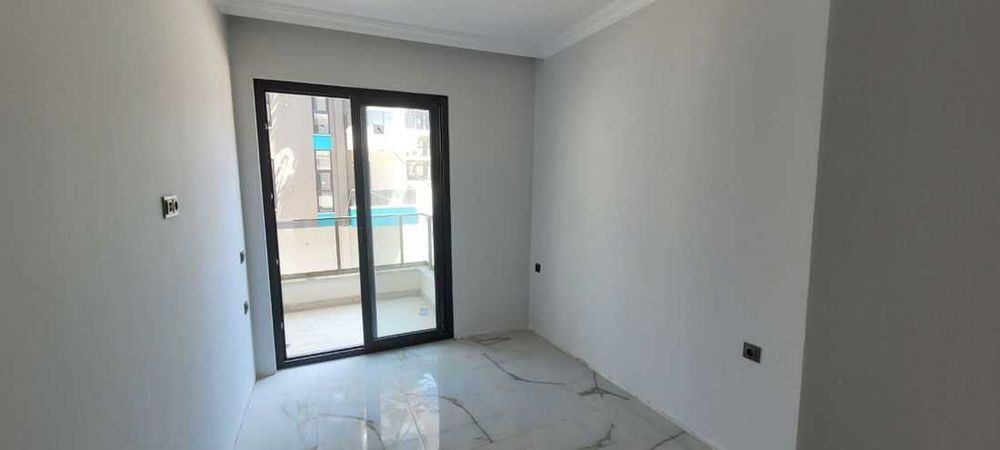 Квартира в современном комплексе в центре Алании пляж Клеопатра Турция