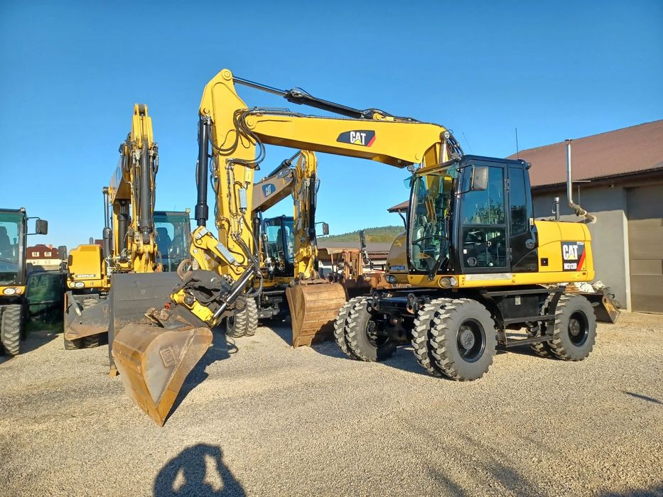 Caterpillar CAT M 313 D  koparka kołowa CAT sprowadzona z Niemiec Rototilt