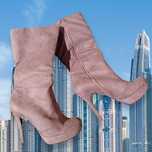 Botas cano alto.