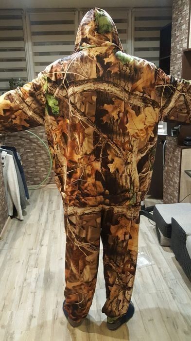 мужскую одежду  52 размер