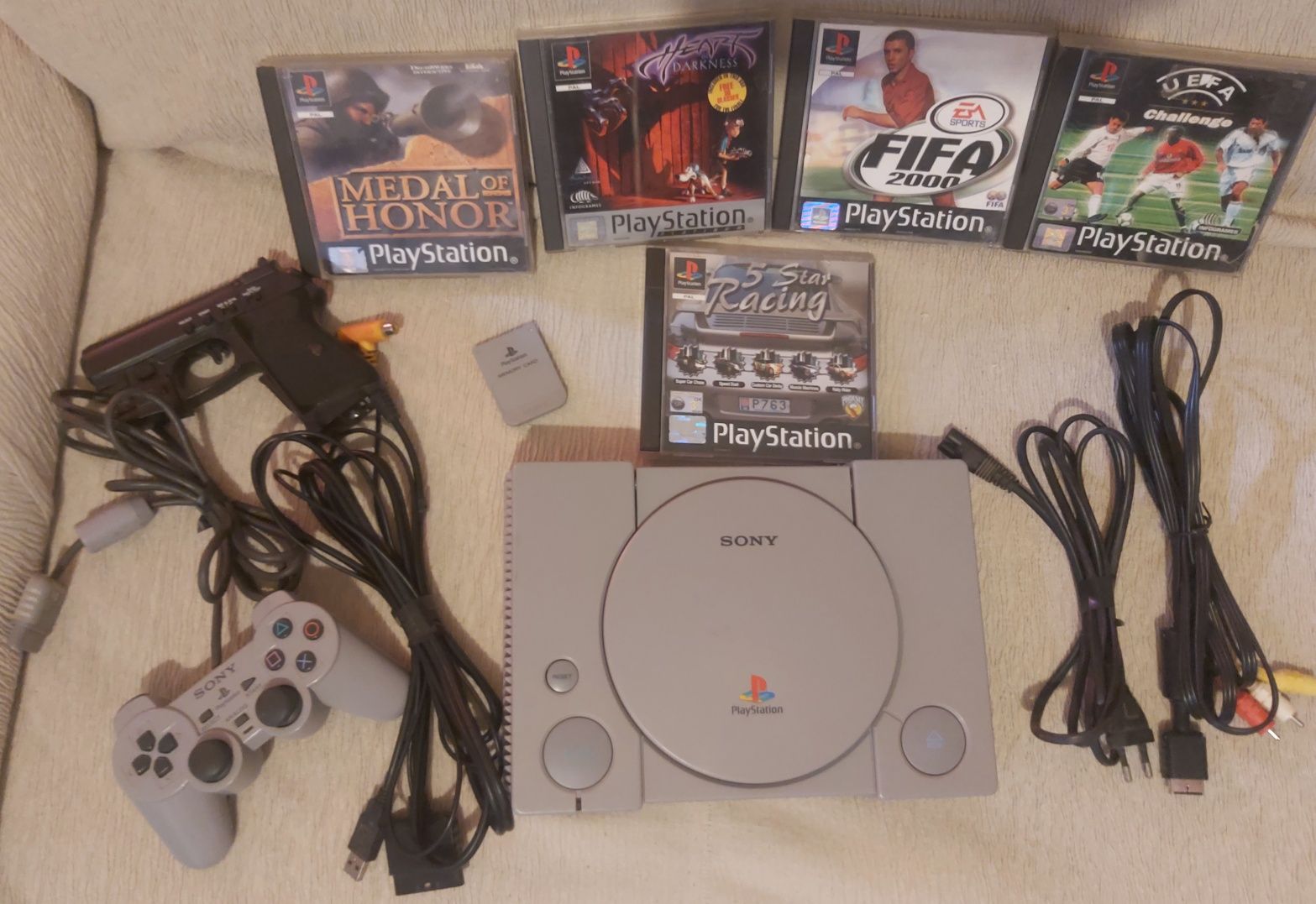 Ps1 fat com Jogos pistola cartão de memória e comando original.