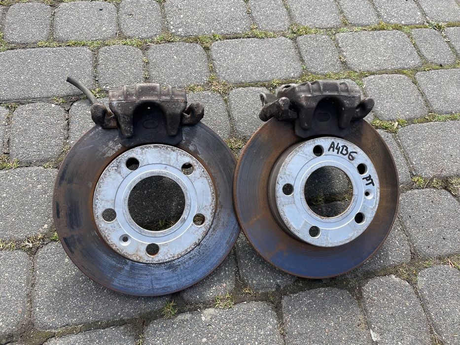 AUDI A4 01- B6 B7 ZACISK HAMULCOWY TYŁ LEWY PRAWY TARCZE KLOCKI KOMPLET