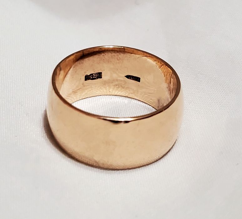 Обручальное кольцо золотого цвета с советской пробой 583 периода ссср
