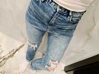 H&M jeansy spodnie dżinsy marmurkowe niebieskie dziury wysoki stan M