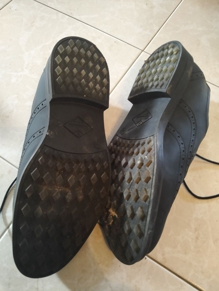 Sapatos de golfe