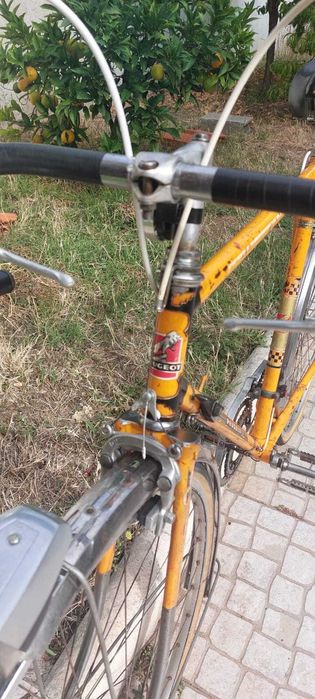 Bicicleta Peugeot randoneur vintage laranja roda 700c 28
Tamanho 56