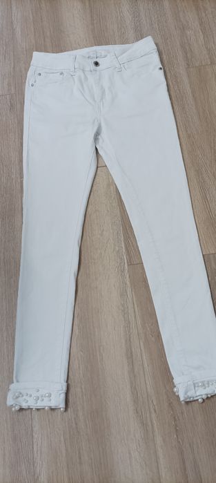 Białe jeansy dl7/8 rozm 36-38