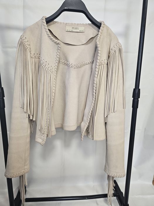 Casaco de pele com franjas