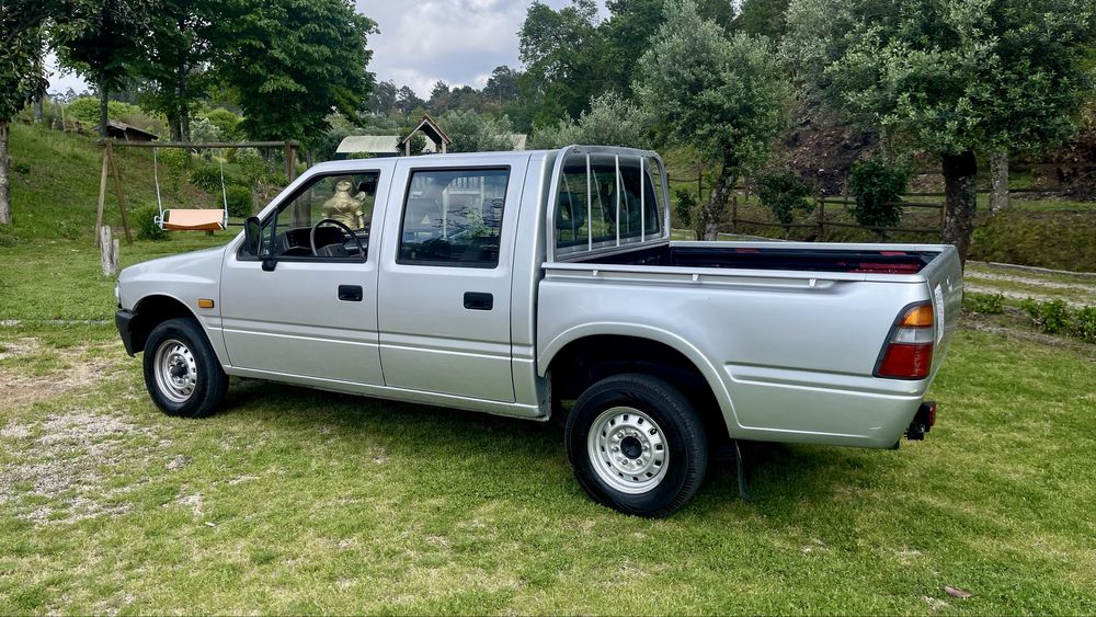 Pick-up Opel Campo cabine dupla+caixa aberta 4x2 motor Isuzo 2.5