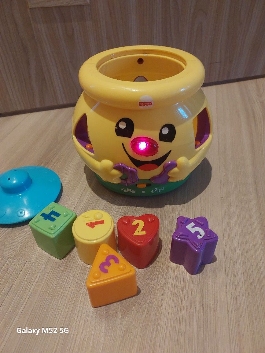 Garnuszek Fisher price sorter muzyka świeci