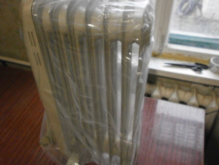 Масляный обогреватель Scarlet sc-1152